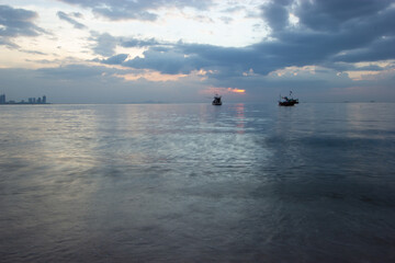 sunset on the sea , Fishing boats at sunset, Bang Lamung, Chon Buri, Thailand
