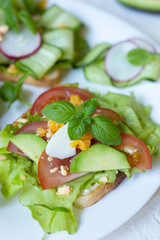 Breakfast sandwich on a white table