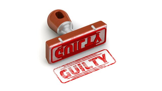 Guilty. The stamp and an imprint. Wooden stamp and red imprint GUILTY on white surface. Footage video