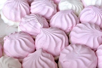 Pink and white marshmallow close up in a box