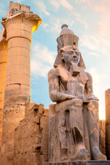 Ramesses ii statues. Statues at the Temple of Amun-Ra at Luxor. Egypt. ramesses II ,Luxor ,EGYPT, Egypt Luxor Temple. granite Statue of Ramesses II seated in front of columns
