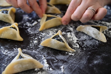 Jewish woman preparing Hamantash cookies
