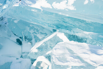 Fototapeta na wymiar Broken icicles on frozen ice of Baikal lake