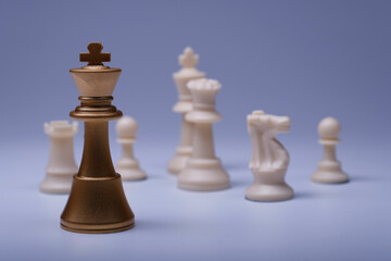 Golden pieces of chess. Business, Competition, Game or Political idea with chess