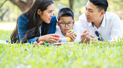 Colourful Easter eggs and family.
