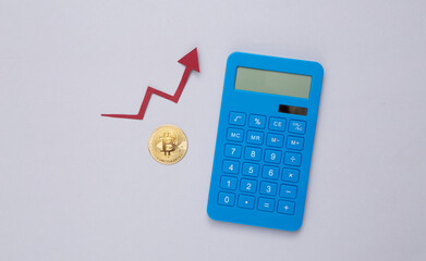 Bitcoin, calculator and growth arrow on gray background. Cryptocurrency. The rise in the value of bitcoin