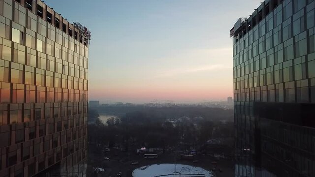 Drone video of office building at sunrise in Bucharest Presei Square. Skyscrapers in Bucharest, Romania