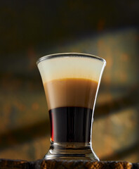 Cocktails in glassware on stone background