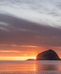 Sunset in the north sea. Landscape in the style of minimalism. paradise beach Haukland Lofoten Islands in polar Norway.