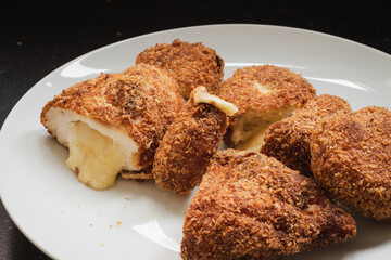 Chicken nuggets filled with cheese