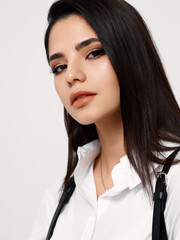 sexy brunette in white shirt portrait closeup makeup 