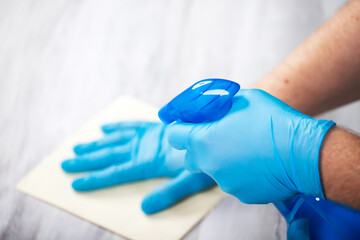 Cleaning surfaces with an antiseptic during a coronavirus epidemic.