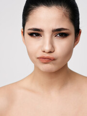 Obraz premium pretty emotional woman with bare shoulders glamor close-up