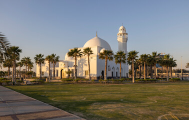 Fototapeta premium Jawzaa Alqahtany Mosque on the Al Khobar Corniche, Eastern Province of Saudi Arabia during sunrise.