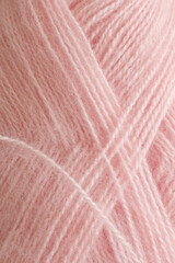 Fototapeta premium soft pastel pink yarn close up
