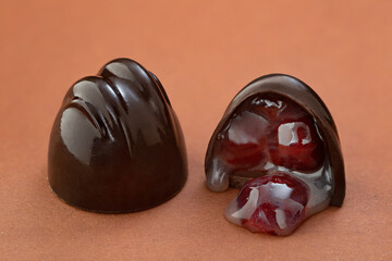 Chocolate candy on a colored background