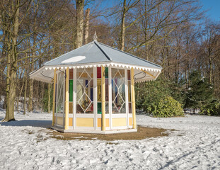 Wooden Tea House, in a nature park during wintertime