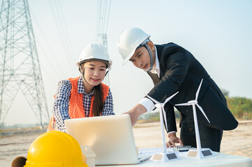 engineer worker with electric pole and blue sky