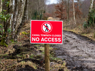 Red no access sign canal tow path closed Worsley Manchester Bridgewater