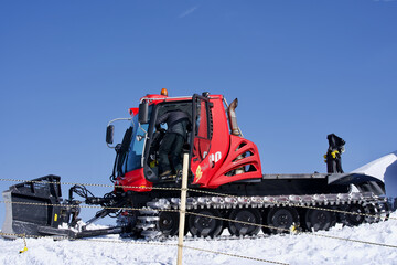 Snowcat preparing to plow the slope. Photo taken February 26th, 2021, Jungfraujoch, Switzerland.