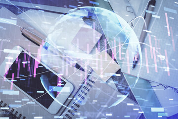 Multi exposure of forex graph hologram over desktop with phone. Top view. Mobile trade platform concept.