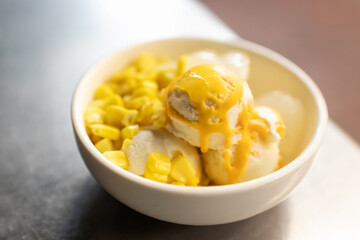 Coconut milk ice cream with egg yolk and topping; Thai dessert style.