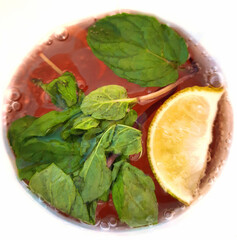 Alcoholic drink cola, rum, mint, lime