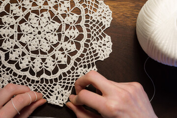 Close-up of female hands knitting