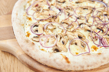 pizza on a wooden board