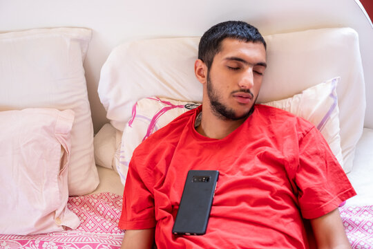 Muslim man having a nap in the bed room