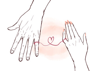 赤い糸で結ばれた男女の手