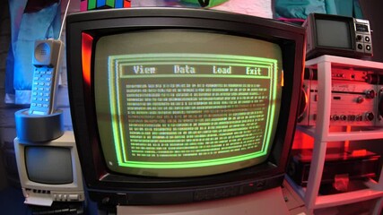 Retro 80s 90s vintage computer hacking with green coding on black background.