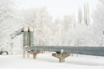 Overhead heating pipes conducting heat into the city, winter Russia