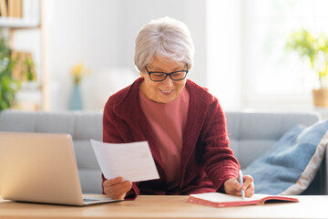 woman with a paper receipt