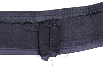 Twill samples showing stitches and tattered threads