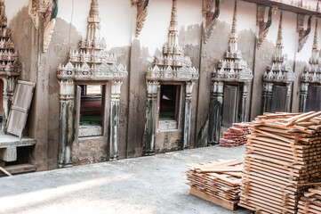 The windows of the Ancient Buddhist Church at Wat Khun Samut Chin temple, Samut Prakan province Thailand