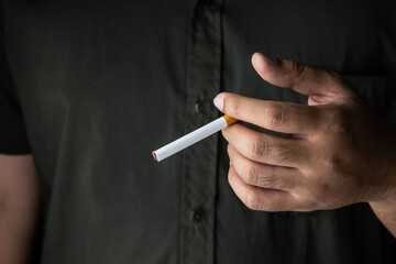A young man with a cigarette He is going to smoke