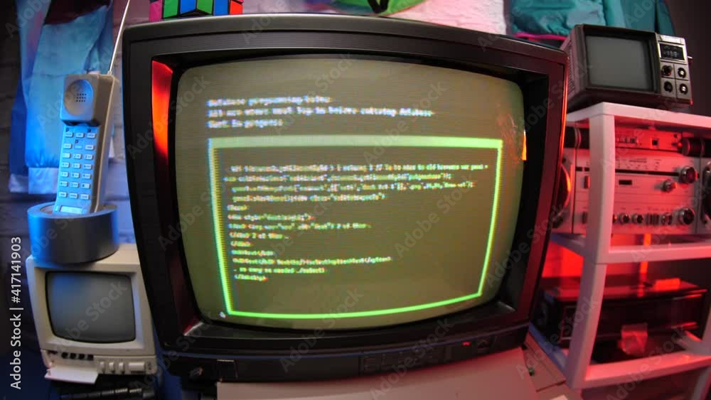 Wall mural retro programming concept on a vintage 80s 90s computer monitor.