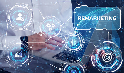 Fototapeta premium The concept of business, technology, the Internet and the network. A young entrepreneur working on a virtual screen of the future and sees the inscription: Remarketing