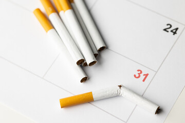 Quit smoking on May 31, the World No Tobacco Day. For good health Broke the cigarette and put it on the calendar.