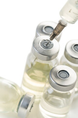 syringe and medicine bottle