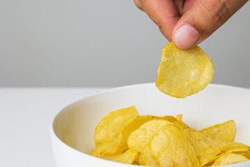 Crispy potato chips. Snacks Fast food or junk food snacks unhealthy concept.