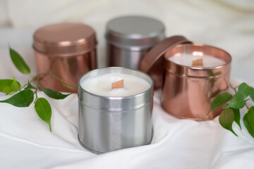 Homemade organic scented soy candle with a wooden wick. 