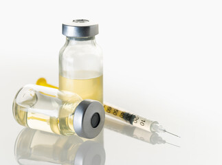 syringe and medicine bottle