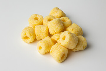 Crispy Corn rings salty snacks. Fast food or junk food snacks unhealthy concept.