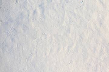 Obraz premium White fluffy snow, texture or background, top view.