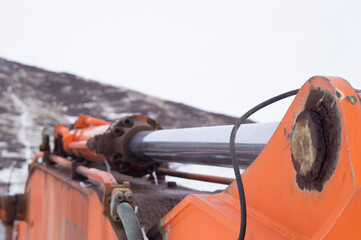 Excavator bucket piston. Excavator bucket hydraulic mechanism.
