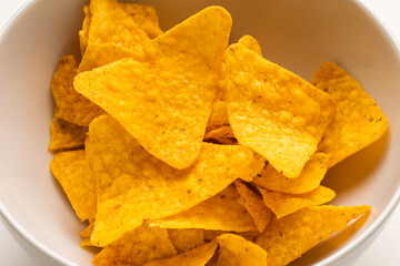 Crispy mexican nachos chips salty.Snacks Fast food or junk food snacks unhealthy concept.