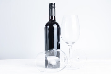 Bottle of red wine and glasses
