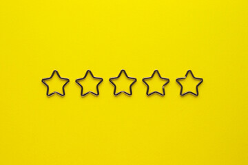Five shiny metal split key rings in shape of star for keychains. Chromium plated keychain clasp on...